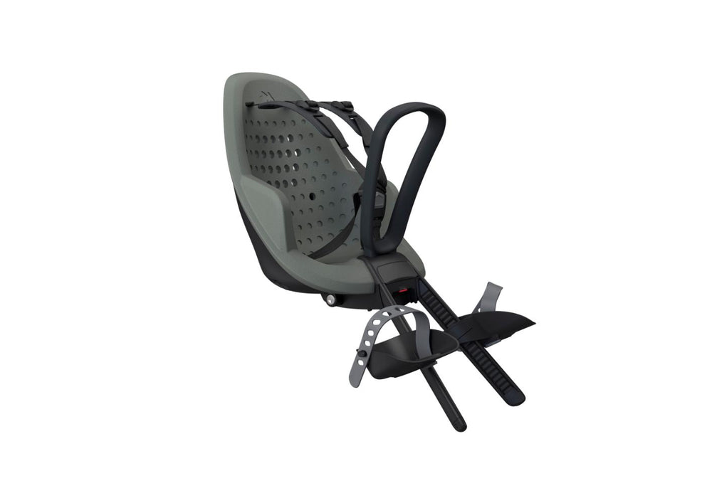 Barnestol Thule Yepp Mini 2 i farven Agave, designet til cykler, med sikkerhedsseler og komfortabel polstring til børn.