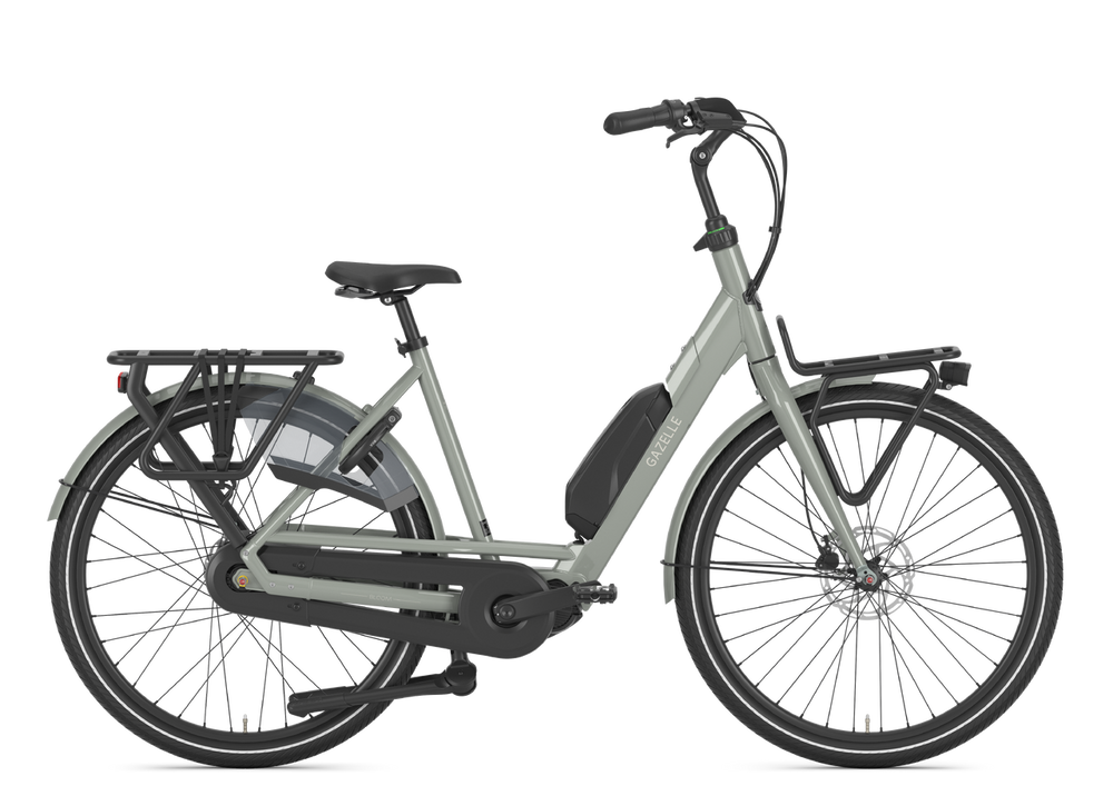 Gazelle Bloom C310 Dame i lergrøn, 2025-model, cykel med elegant design og komfortabelt sæde, set fra siden.