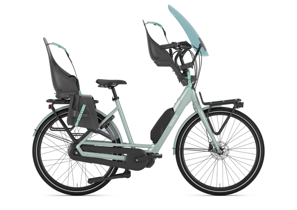 Gazelle Bloom C380 HMS Dame Light Olive 2025 cykel i olivengrøn farve, set fra siden med elegant design.