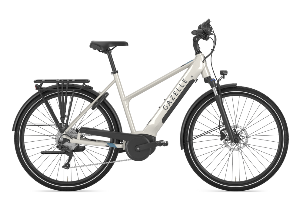 Billede af Gazelle Medeo T10 HMB cykel til damer i farven Ivory White, der viser cyklens elegante design og komfortable geometri, ideel til daglig brug og cykelture.