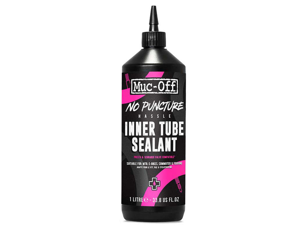 Billede af Mucoff No Puncture Hassle Inner Tube Sealant, en flaske med grøn væske designet til at forsegle punkteringer i cykelslanger.