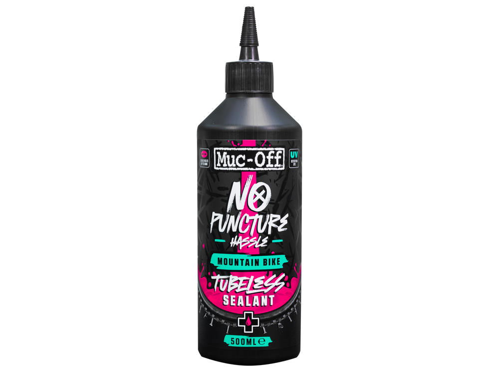 Flaske med Mucoff MTB Tubeless sealant på 500 ml, designet til at tætne punkteringer i tubeless mountainbike-dæk.