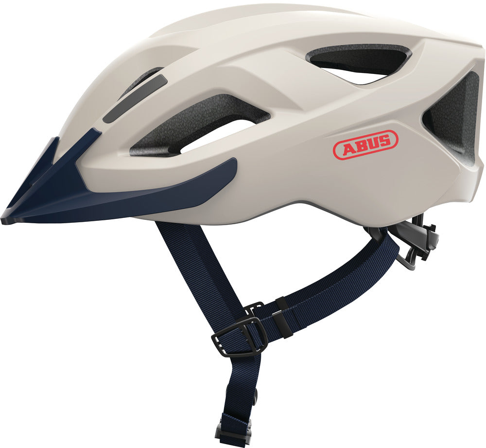 Cykelhjelm Aduro 2.1 i farven Grit Grey set fra siden, der viser dens aerodynamiske design og ventilationshuller.
