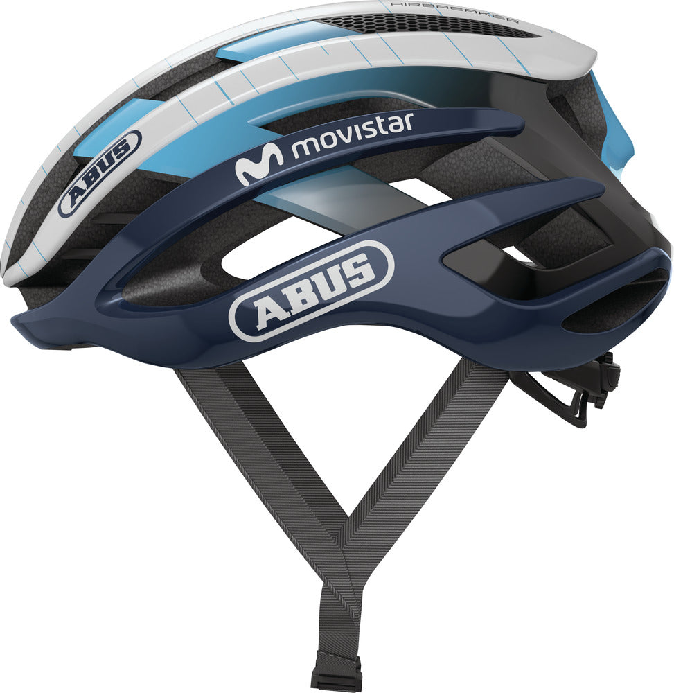 Cykelhjelm Abus AirBreaker i Movistar Team 22 design, set fra siden, med aerodynamisk form og ventilationsåbninger, perfekt til cyklister.