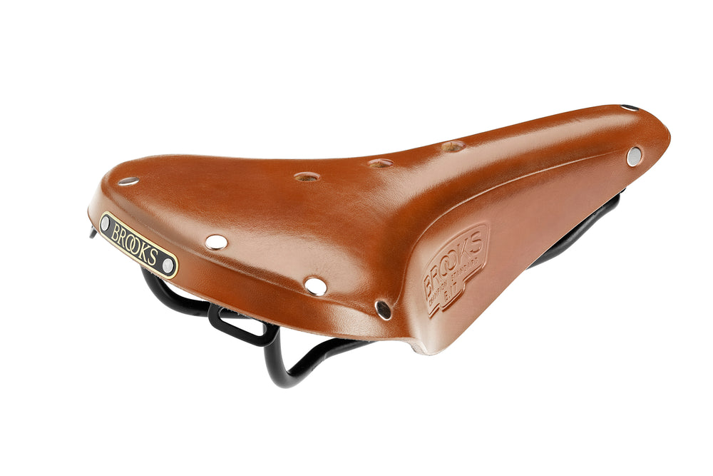 Billede af en Brooks B17 Standard sadel i farven honey, designet til cyklister med fokus på komfort og holdbarhed.