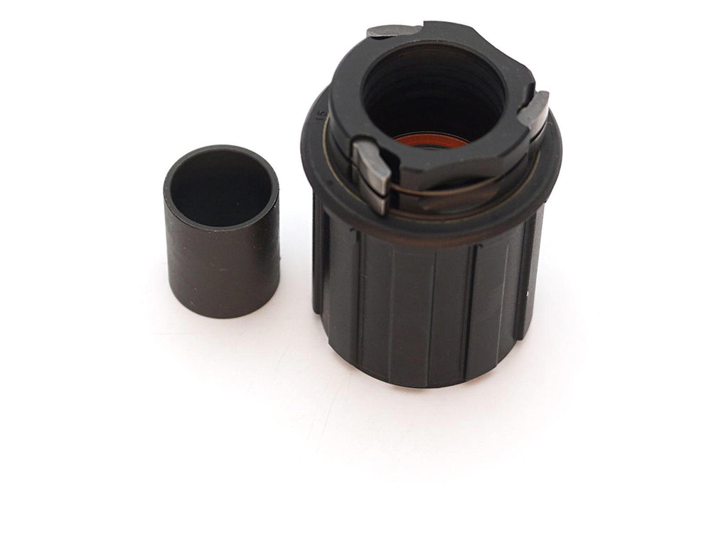 Crankbrothers Freehub body i sort, designet til at forbedre cykelens præstationer og holdbarhed.