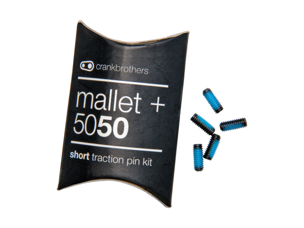 Billede af Crankbrothers Pin kit, der indeholder forskellige pins til cykelpedaler, præsenteret på en hvid baggrund.