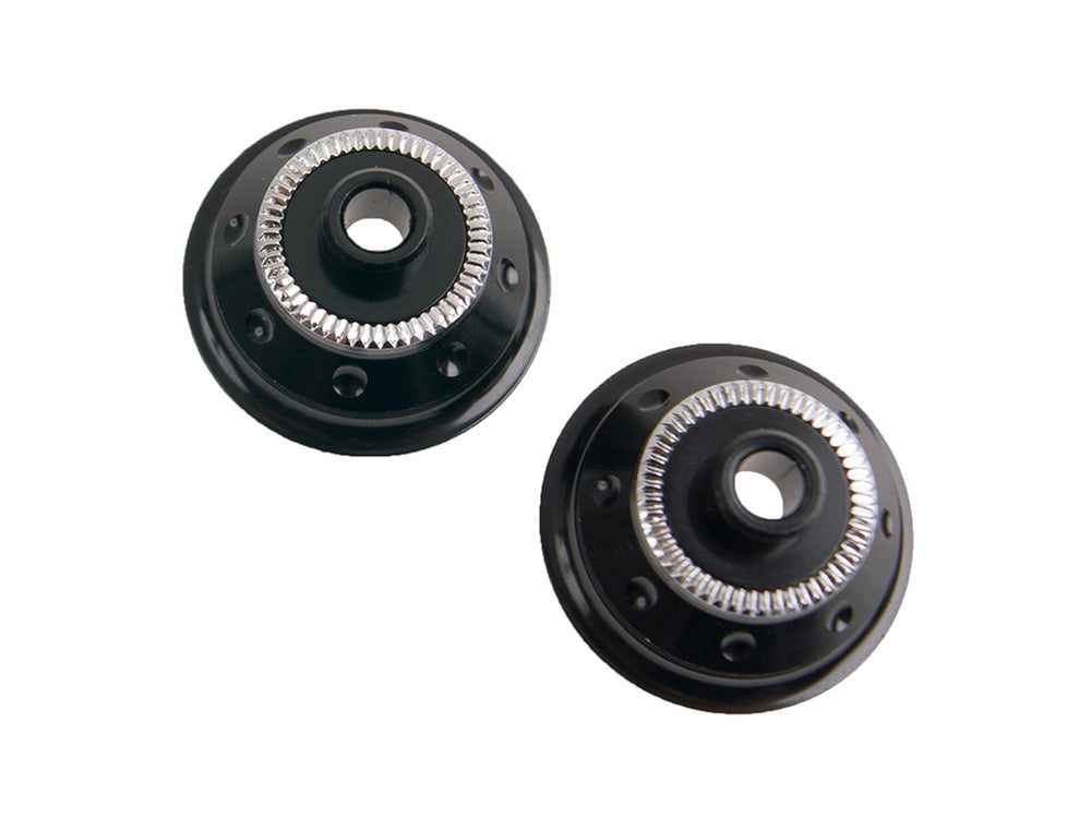 Crankbrothers End cap til cykelpedaler i sort, designet til at beskytte pedalerne og sikre optimal ydeevne.