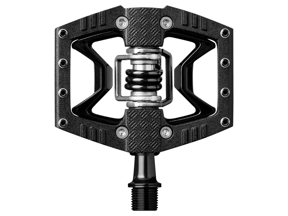 Crankbrothers Double Shot 3 pedaler med sort og sølv design, ideelle til både mountainbike og landevejscykling.