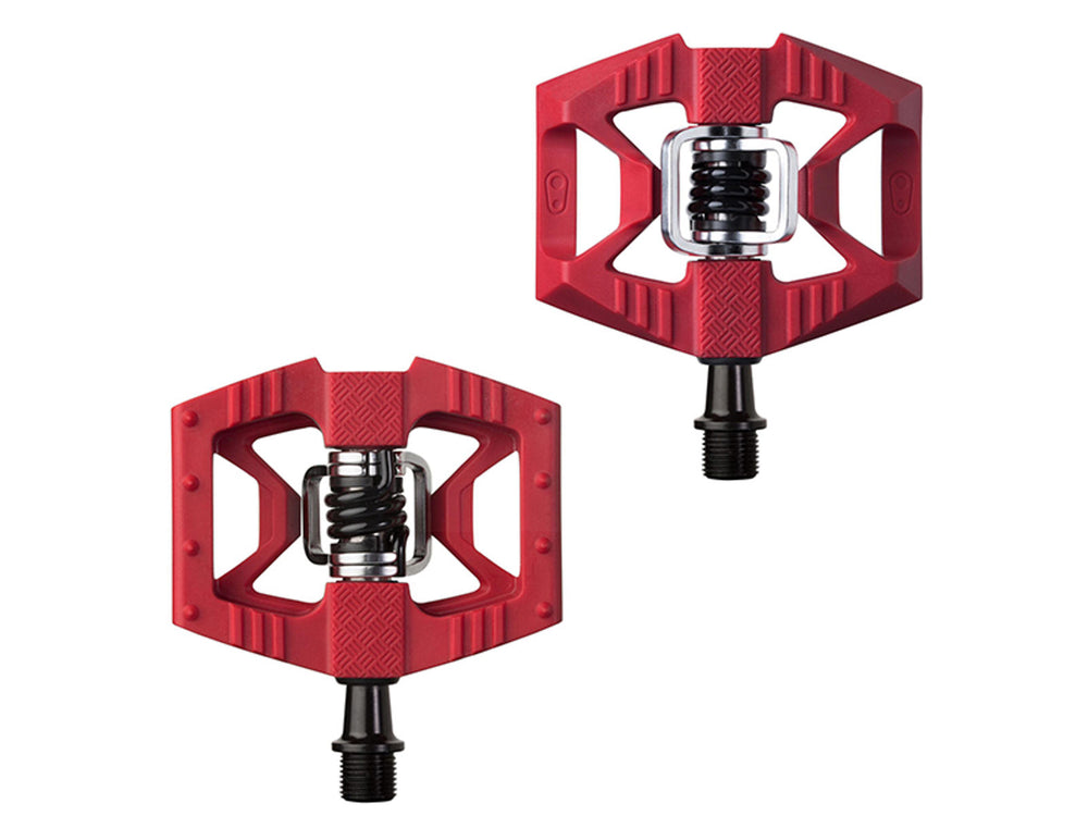 Billede af Crankbrothers Double Shot 1 pedaler, der viser deres robuste design og slidstærke materiale, ideelle til både mountainbike og landevejscykler.