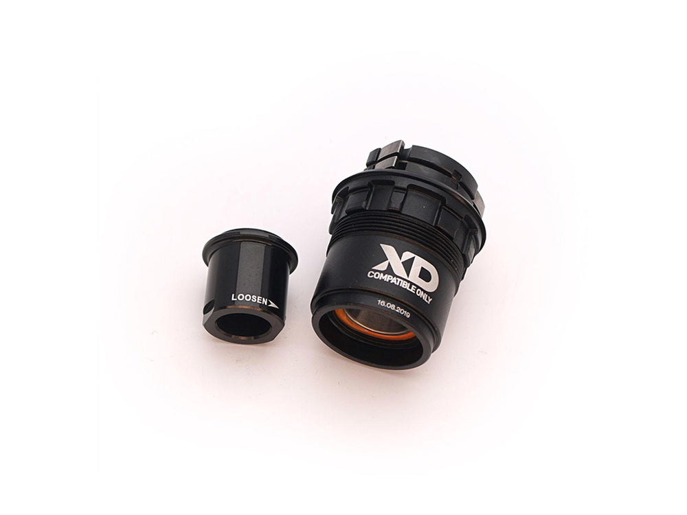 Crankbrothers Freehub body XD / Alloy Driver, der viser en solid og holdbar drivaksel til cykler, designet til at sikre effektiv kraftoverførsel og forbedre din cykeloplevelse.