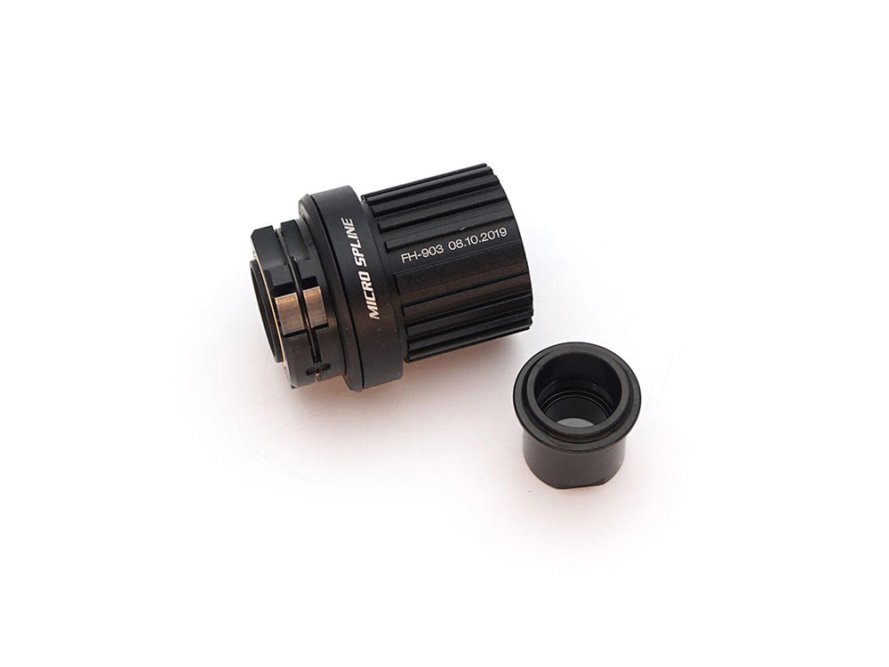 Crankbrothers Freehub body til Shimano Micro Spline, lavet af letvægts aluminium, designet til effektiv kraftoverførsel og holdbarhed.