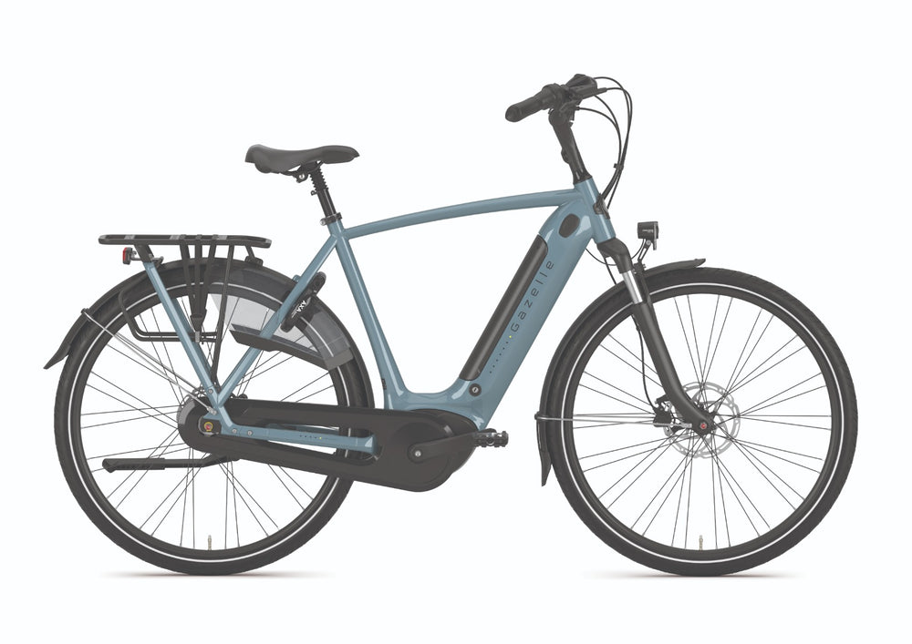 Gazelle Grenoble C7+ HMB cykel i farven Thunder Grey, set fra siden, med fokus på stel, dæk og komfortable sadel.