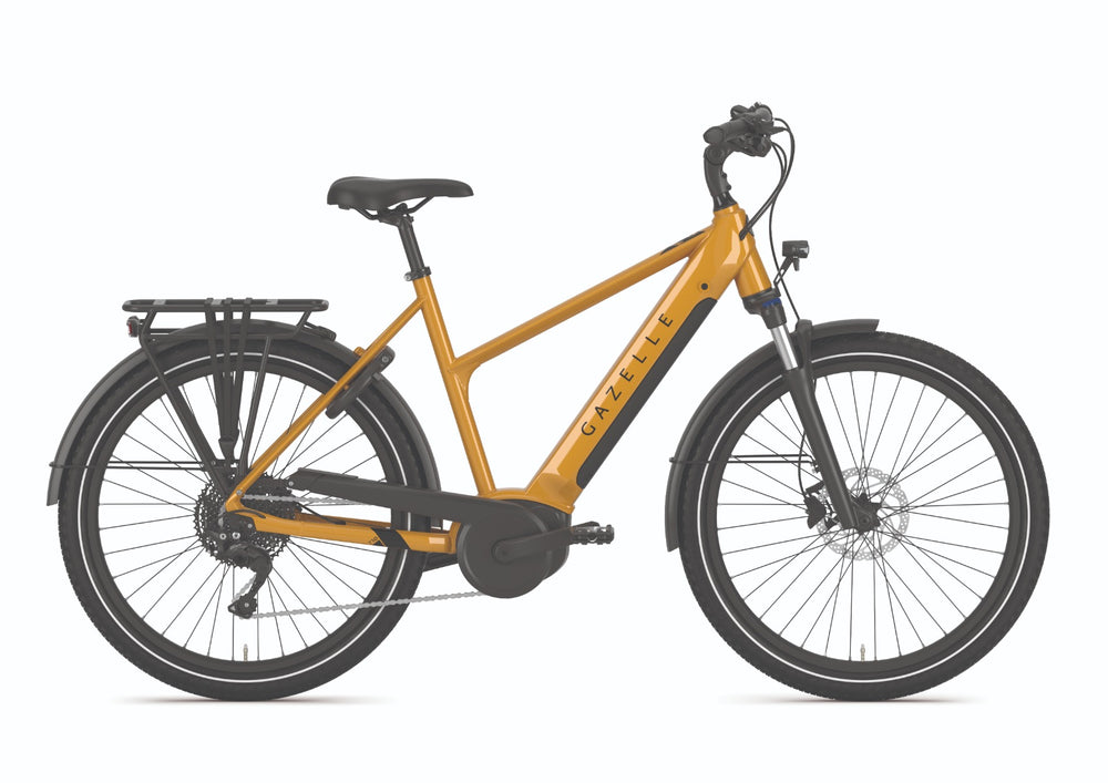 Gazelle Medeo T10 HMB cykel i farven Turmeric Yellow, størrelse M, set fra siden med fokus på stel og dæk.