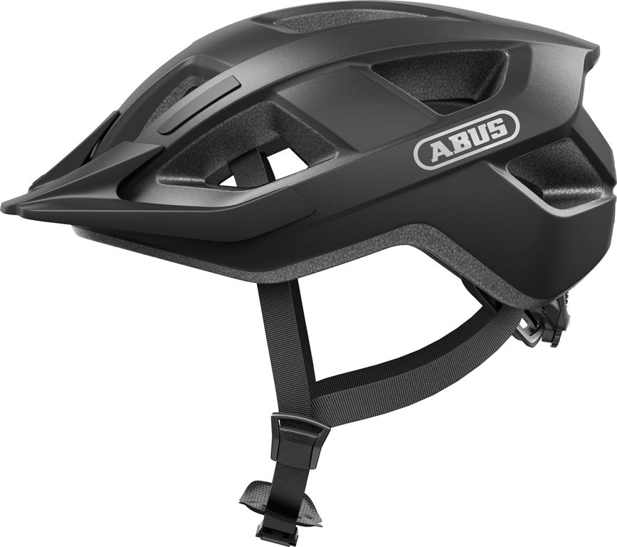 Produktbillede af hjelmen Aduro 3.0 Titan, en moderne cykelhjelm i grå med ventilationshuller og justerbar rem.