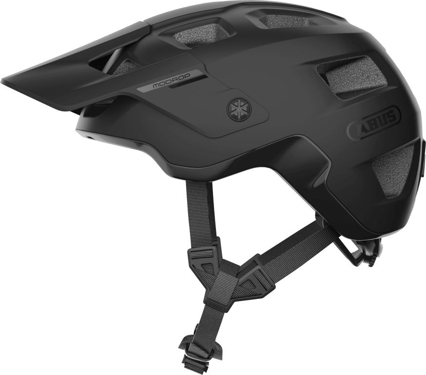 Cykelhjelm Abus Modrop Velvet Black på en hvid baggrund, viser hjelmens elegante sorte design og justerbare stropper.