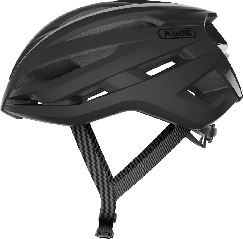 Cykelhjelm Abus StormChaser i fløjlsort farve, set fra siden med aerodynamisk design og ventilationshuller.