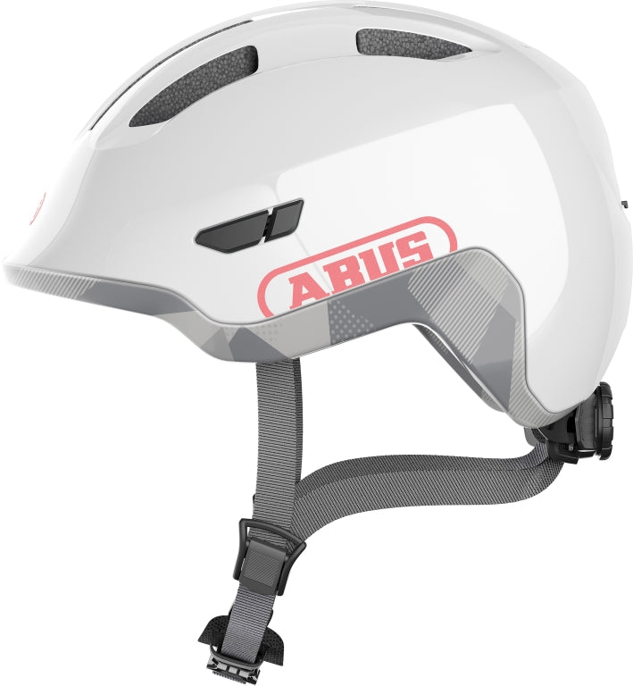 Cykelhjelm Abus Smiley 3.0 ACE LED Shiny White, en hvid cykelhjelm med LED-lys og moderne design.