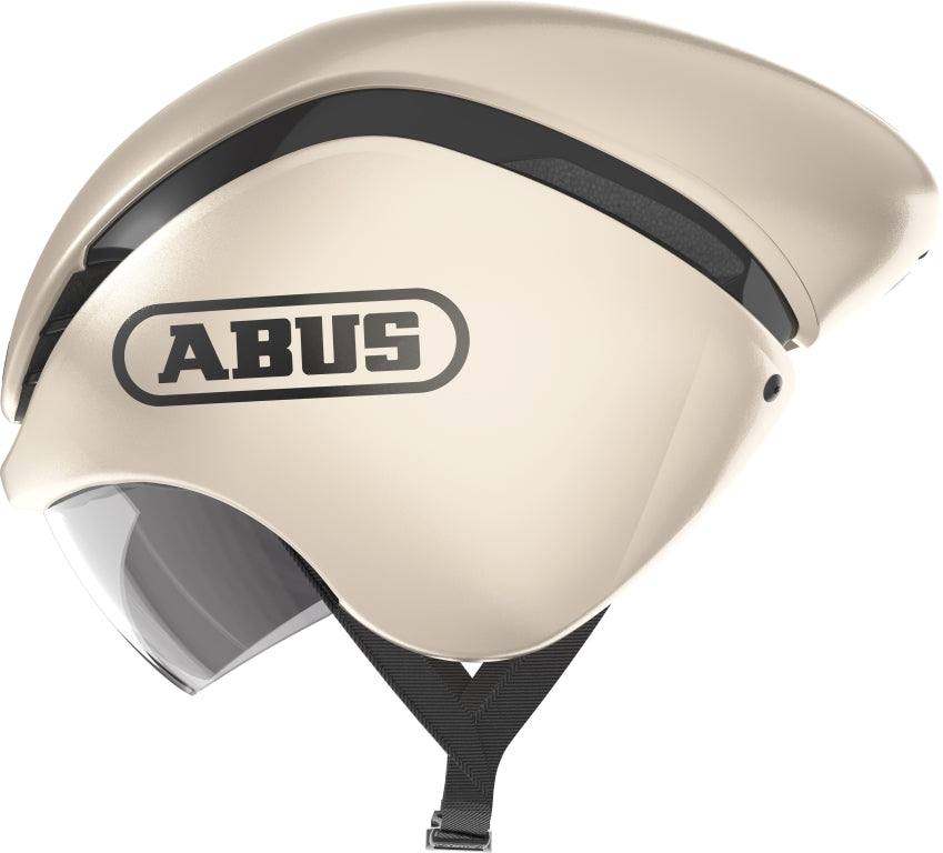Cykelhjelm Abus GameChanger TT i champagne guld, aerodynamisk design med ventilationsåbninger og justerbar pasform.