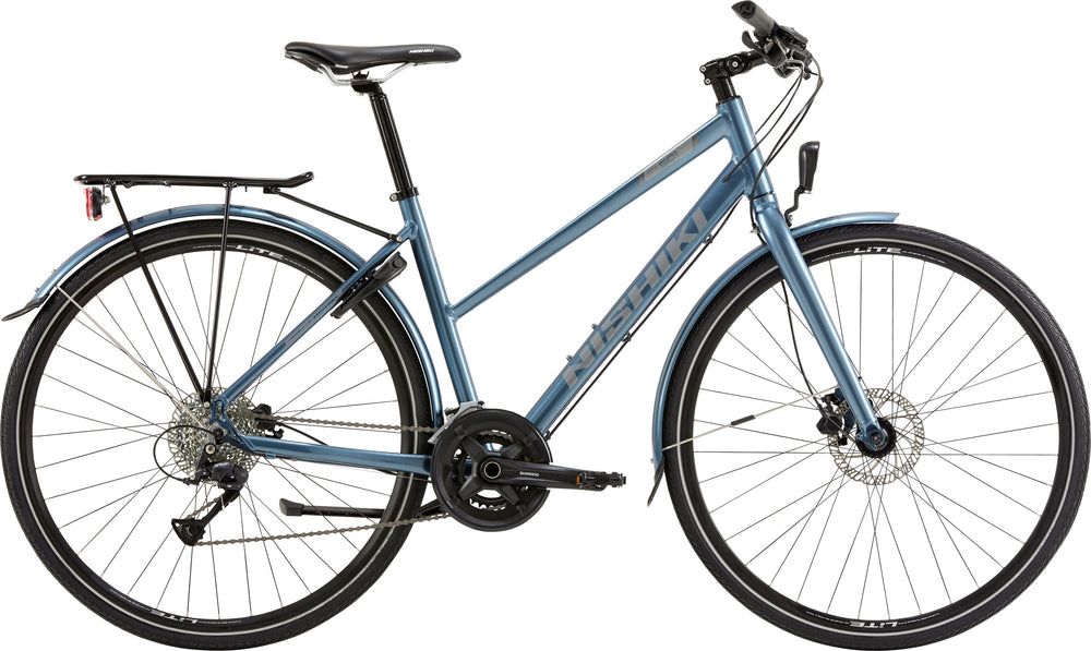 Nishiki City 501 Dame Blå cykel med elegant design, set fra siden mod en hvid baggrund.