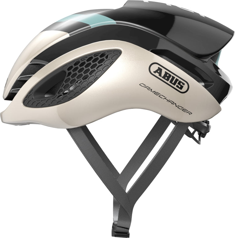 Cykelhjelm Abus GameChanger i champagne guld, elegant design med aerodynamisk form og justerbar pasform.