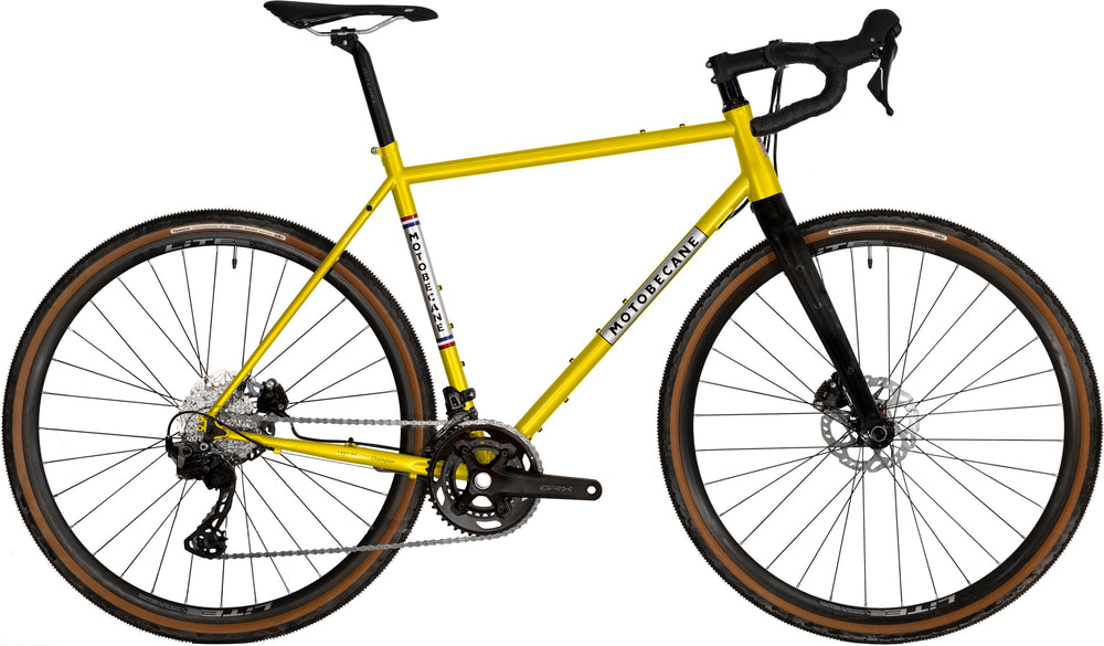 Motobecane 1923 73 Team Champion Herre Gul 20g cykel med gul ramme og sorte hjul, set fra siden.