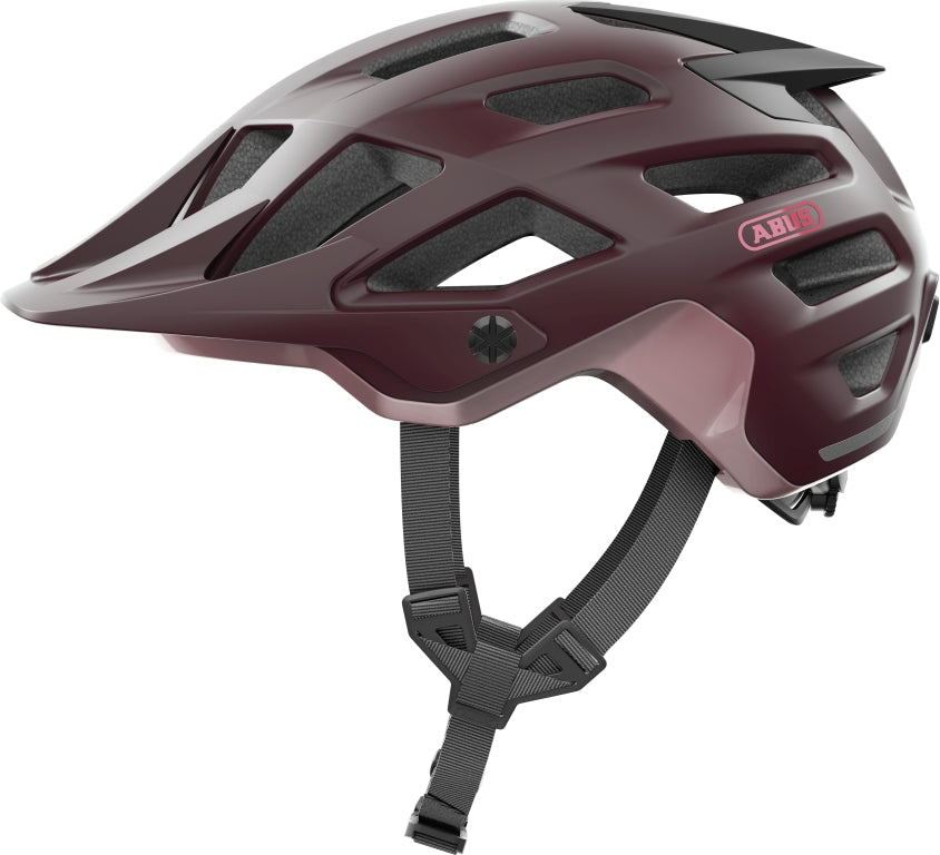 Billede af Abus Moventor 2.0 cykelhjelm i farven wildberry red, set fra siden med ventilationshuller.