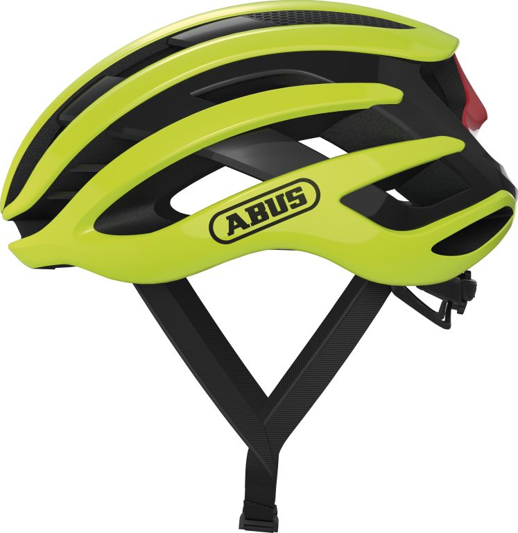 Cykelhjelm Abus Airbreaker i neon gul farve, set fra siden med ventilationshuller og aerodynamisk design.