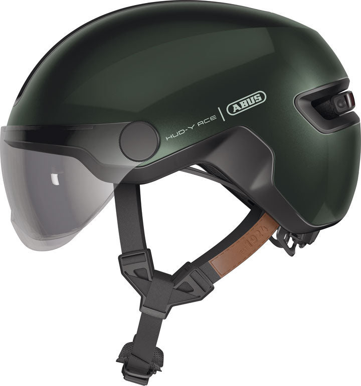 Hjelm Hud-Y Ace Moss Green: En stilfuld cykelhjelm i mosgrøn farve med justerbar rem og ventilationshuller.