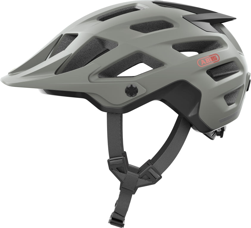 Cykelhjelm Abus Moventor 2.0 i kalkgrå farve, set fra siden med justerbar rem og ventilationshuller.
