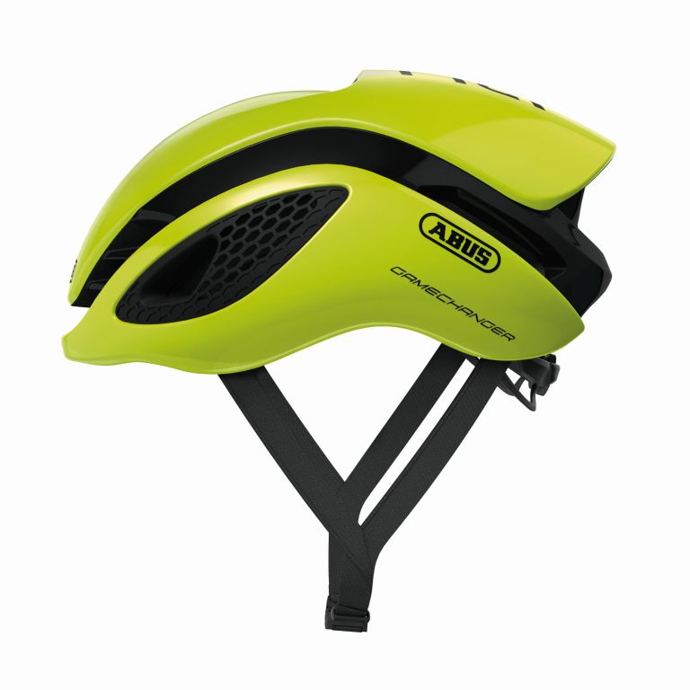 Cykelhjelm Abus GameChanger i neon gul farve, set fra siden med aerodynamisk design og ventilationsåbninger.