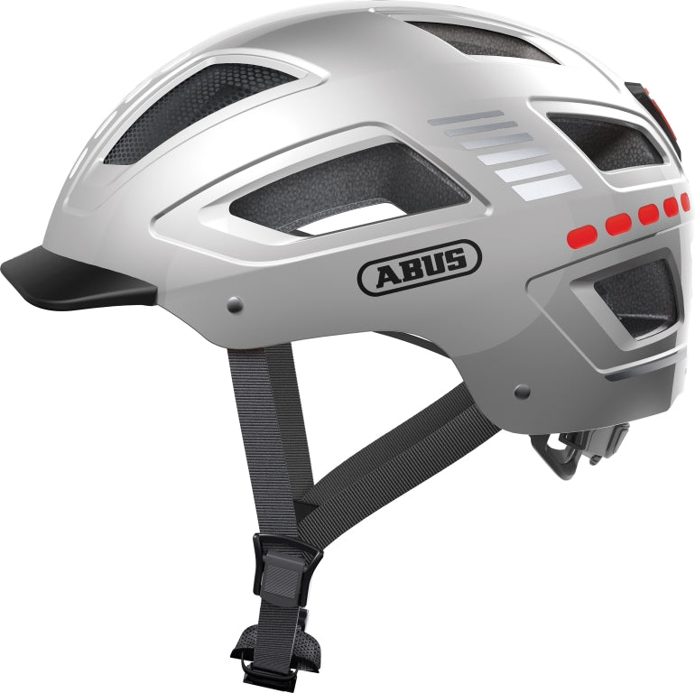Cykelhjelm Abus Hyban 2.0 LED Shiny Signal Glacier 52-58cm, en skinnende hjelm med LED-lys i signalblå farve.