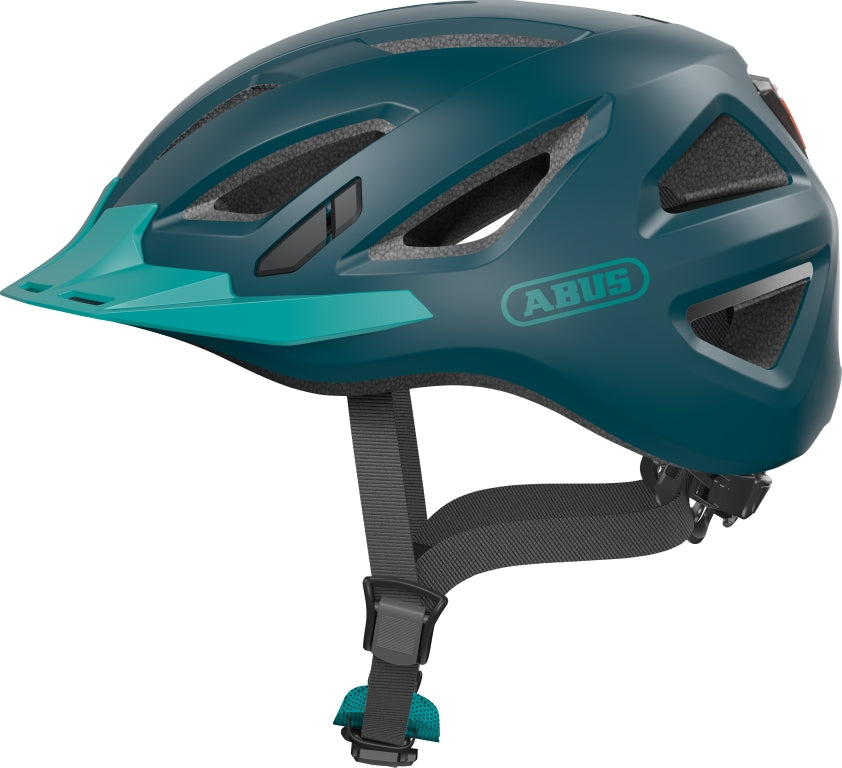Cykelhjelm Abus Urban-I 3.0 Core Green: Grøn cykelhjelm med moderne design og ventilation, set fra siden.