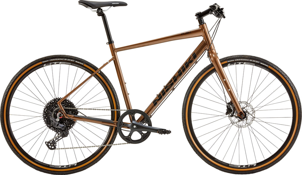 Nishiki Rush herre brun cykel med slankt stel, komfortabelt sæde og robuste hjul, ideel til bykørsel.