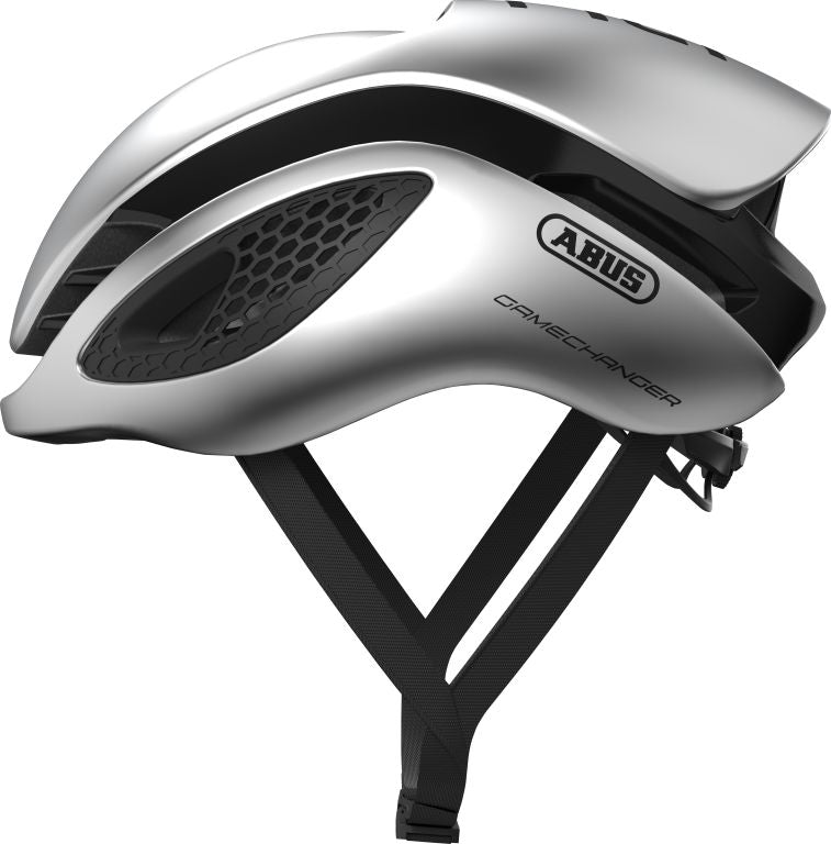 Cykelhjelm Abus GameChanger Gleam Silver: En aerodynamisk sølvfarvet cykelhjelm med moderne design og ventilationsåbninger.