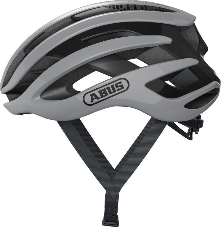 Cykelhjelm Abus Airbreaker Race Grey på en hvid baggrund, viser hjelmens aerodynamiske design og grå farve.