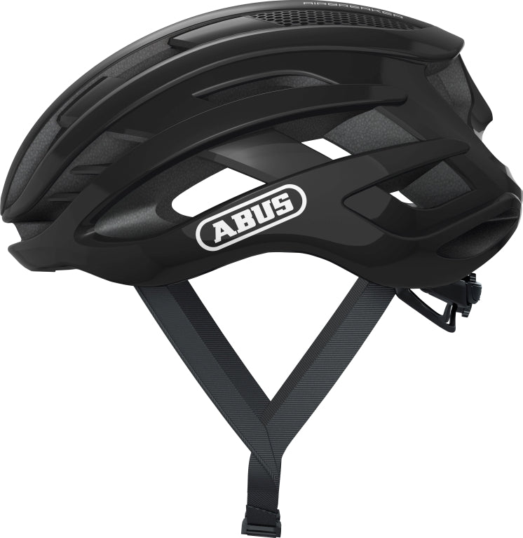 Cykelhjelm Abus Airbreaker i skinnende sort, set fra siden med aerodynamisk design og ventilationshuller.