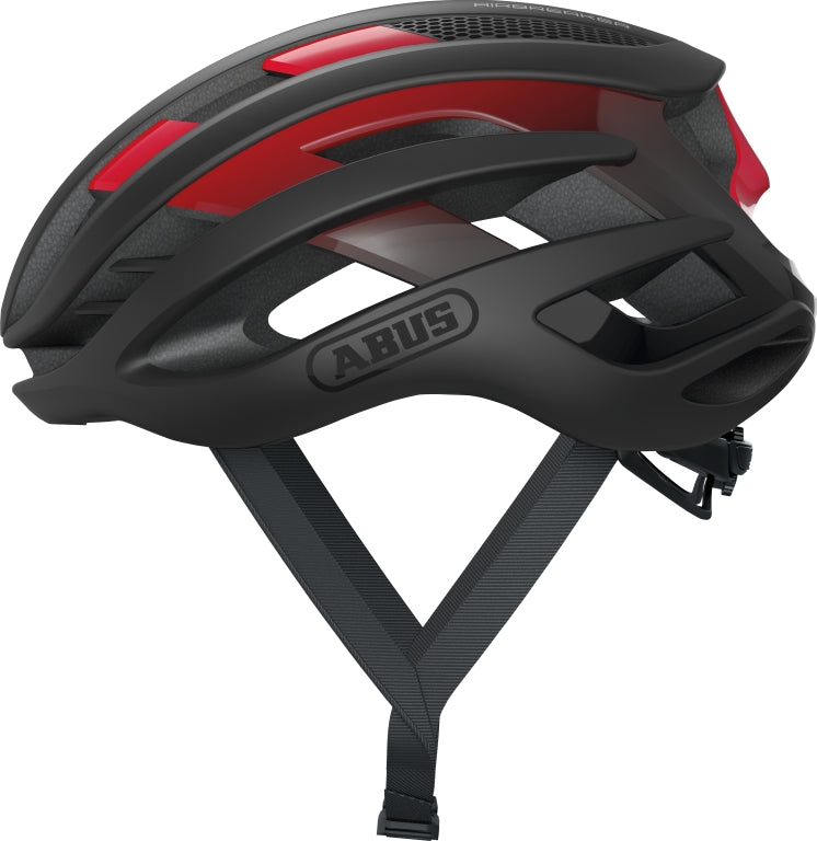 Cykelhjelm Abus Airbreaker Black Red: Sort og rød cykelhjelm fra Abus med aerodynamisk design og ventilationshuller.