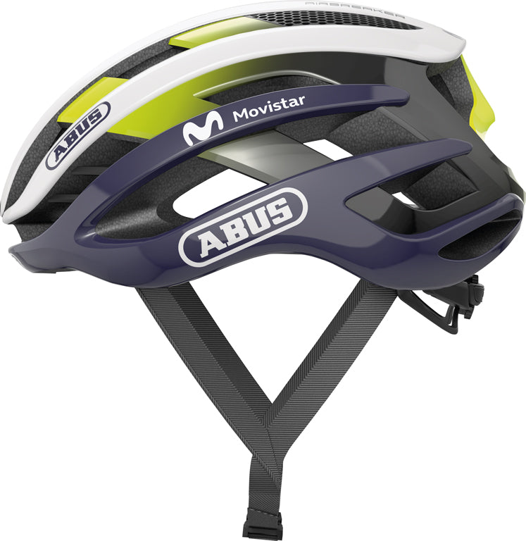 Produktbillede af Abus Airbreaker Movistar Team hjelm, viser en aerodynamisk, blå og hvid cykelhjelm med ventilationshuller.
