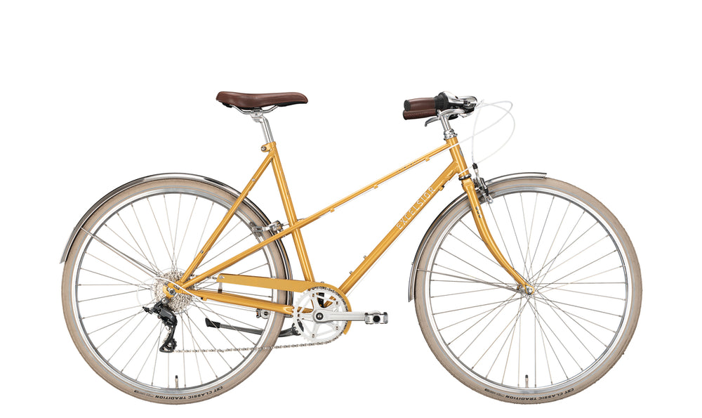Vintage damecykel Excelsior med 8 gear i guld, elegant design og klassisk stil, perfekt til både bykørsel og afslappede ture.
